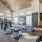 Modern fitness center at Camber Ranch with a variety of exercise equipment including treadmills, weights, and exercise machines, set in a bright and spacious room