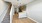 Loft-style room at Camber Ranch featuring an open layout with a staircase leading to an upper level, and modern furnishings